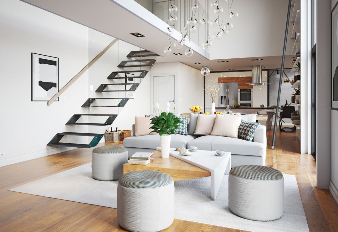 Escalier moderne sublimé par une suspension design et un éclairage harmonieux, alliant sécurité, élégance et ambiance lumineuse contemporaine.