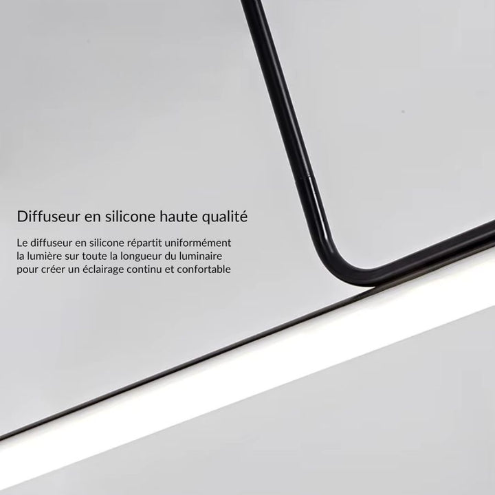 Gros plan sur le diffuseur en silicone d’un lustre tube LED noir, conçu pour offrir une lumière continue et homogène.