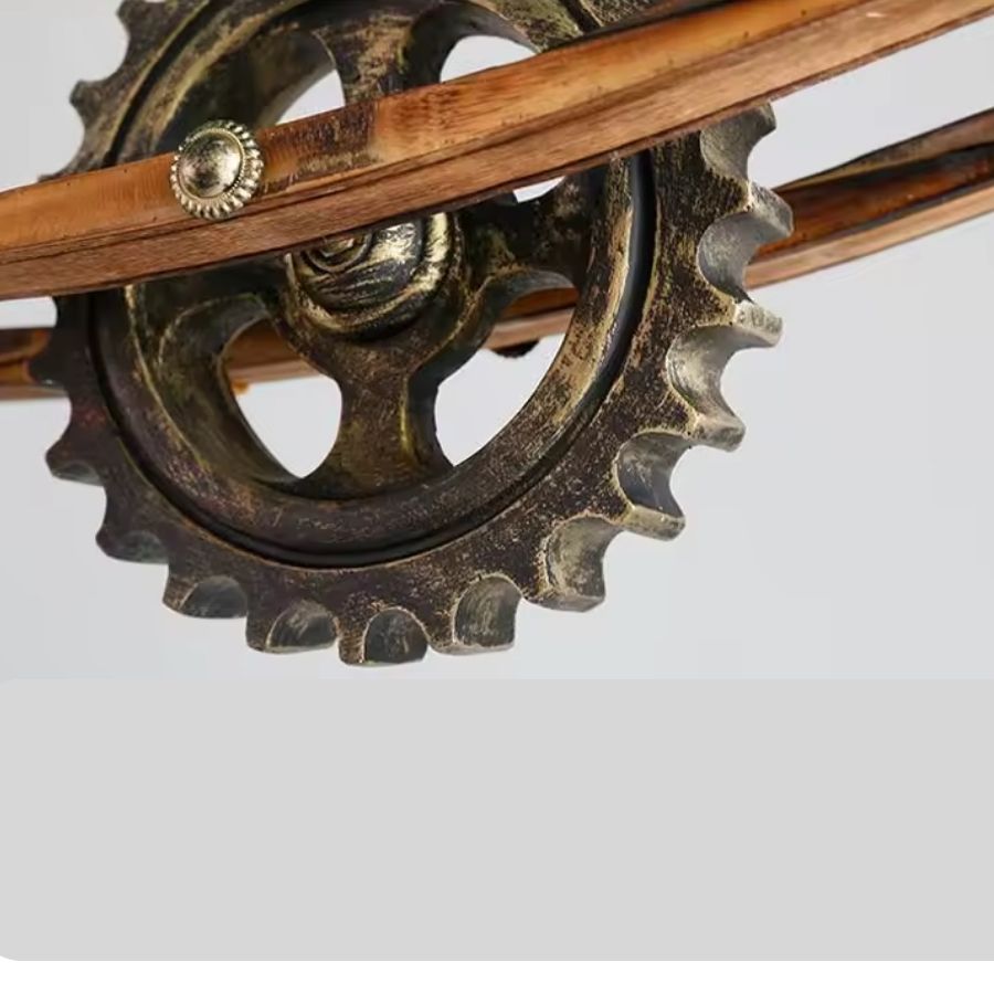 Gros plan sur la roue dentée en résine et la structure en bois d’une suspension au style industriel rétro