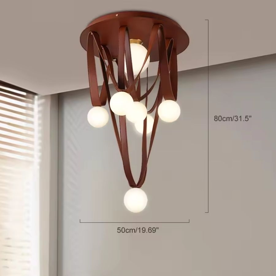 Dimensions de la suspension en cuir brun et globes opalins : 50 cm de large pour 80 cm de hauteur.