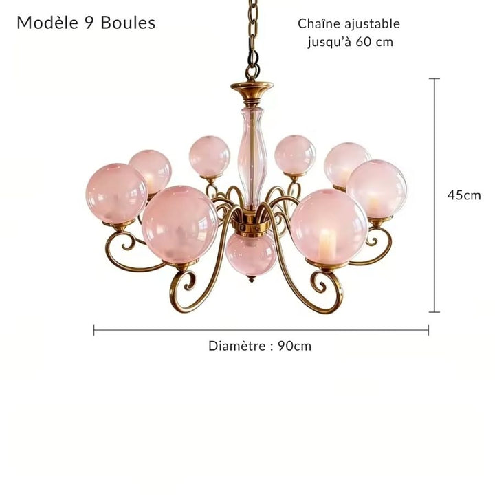 Grand lustre rose poudré à 9 globes en verre, structure dorée ample au style vintage sophistiqué