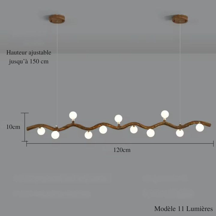 Longue suspension de 120 cm à 11 globes blancs, évoquant une branche sinueuse dans un esprit japonais épuré.
