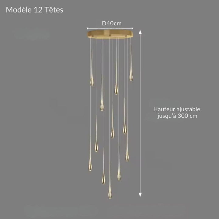 Douze gouttes lumineuses descendent en cascade pour créer un luminaire sculptural au caractère luxueux
