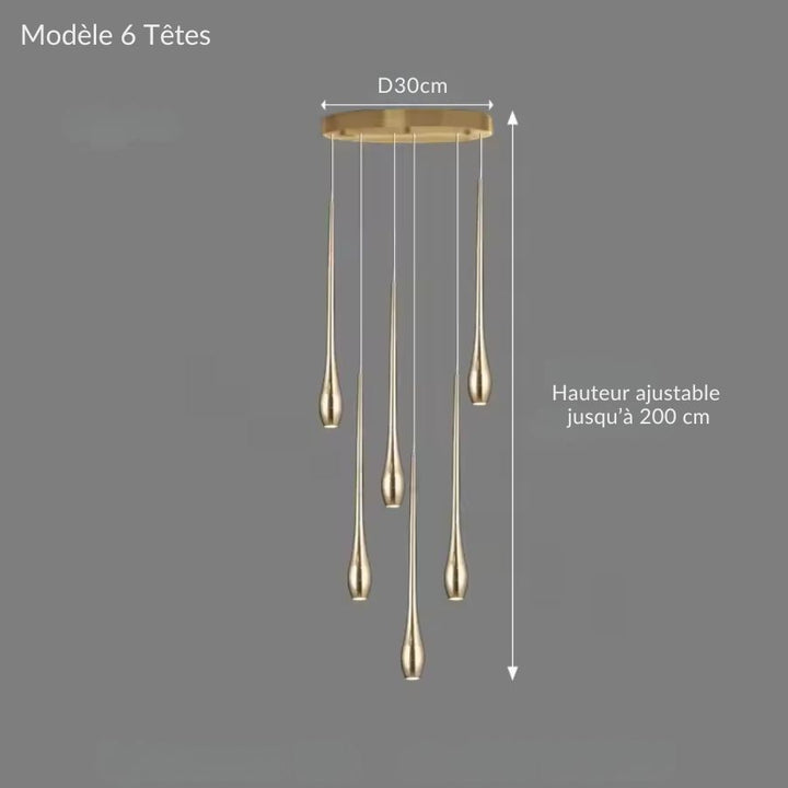 Six gouttes lumineuses dorées composent un luminaire cascade élancé au design moderne et sculptural