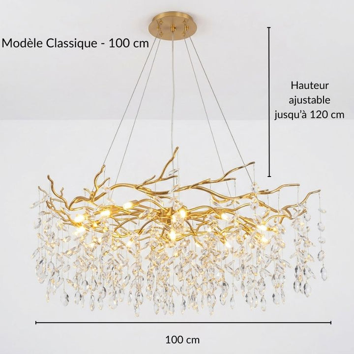 Luminaire majestueux en forme de branche dorée orné de cristaux, diamètre 100 cm, style chic et contemporain.