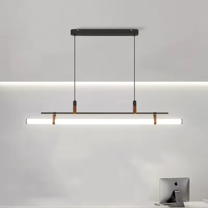 Éclairage linéaire à tube LED blanc, structure noire et attaches en cuir, dans un style minimaliste contemporain