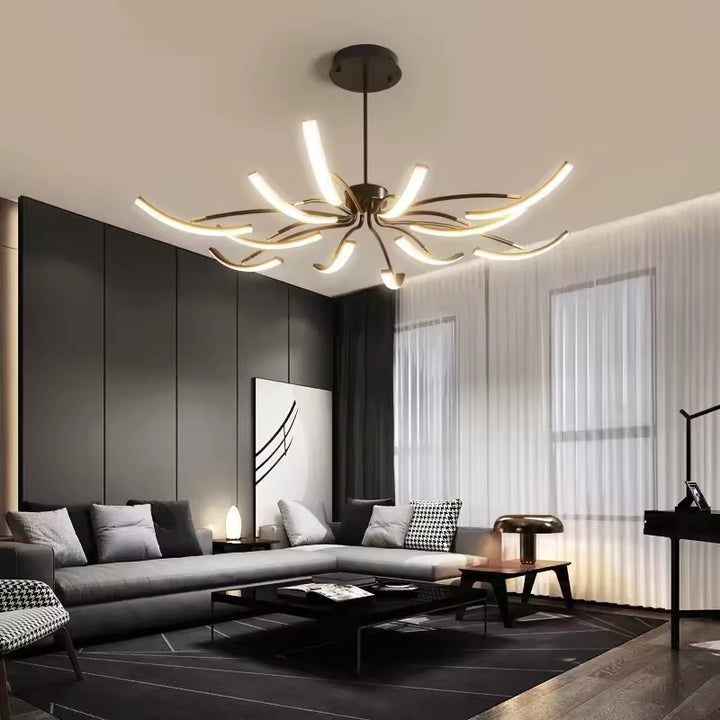 Dans ce salon moderne, le lustre araignée déploie ses bras LED courbés dans un style sculptural et contemporain.