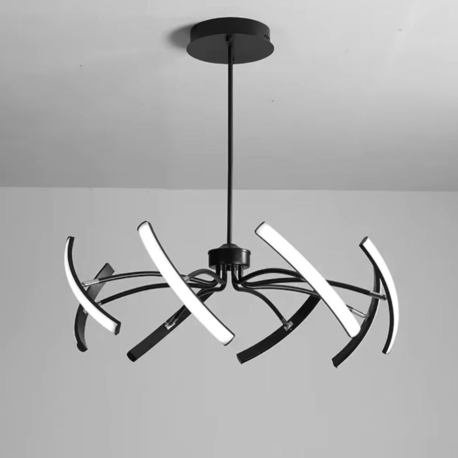 Vue rapprochée d’un lustre araignée noir à bras LED orientables, au style graphique, moderne et sculptural.