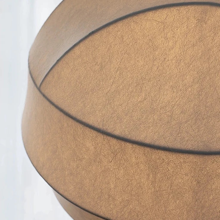 Détail d’un lustre boule tissu blanc à texture fibreuse, au style naturel et japonais, doux et contemporain