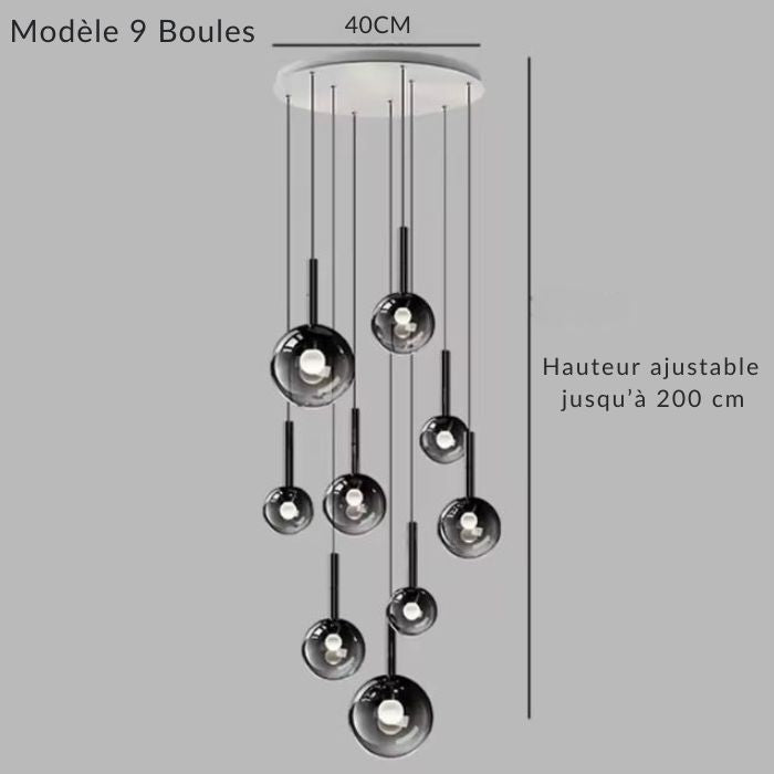 Lustre cascade 9 globes en verre fumé noir, idéal plafond haut, rendu graphique et élégant.