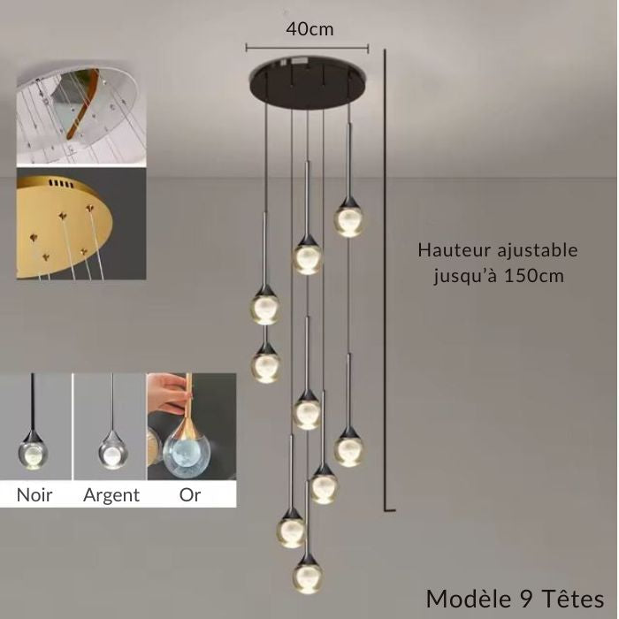 Lustre cascade 9 têtes, verre transparent à cœur opalin, style contemporain graphique pour plafond haut.