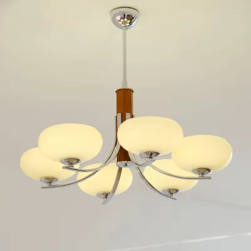 Lustre mid century modern à 6 abat-jour en verre beige, porté par des bras courbes au style rétro élégant