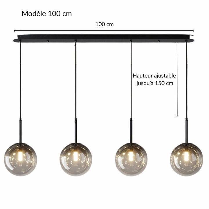 Lustre linéaire moderne doté de quatre globes en verre transparent pour un éclairage de table design.