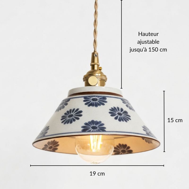 Schéma technique de la lampe suspendue en céramique fleurie montrant ses dimensions et son design épuré en laiton.