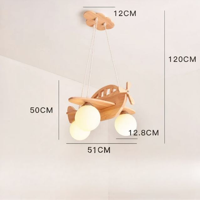 Suspension avion en bois avec dimensions détaillées, idéale pour choisir un luminaire adapté à une chambre d'enfant.