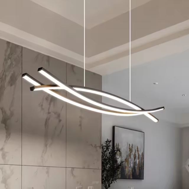 Suspension barre luminaire LED moderne pour cuisine, ajoutant une touche de design élégant et lumineux.