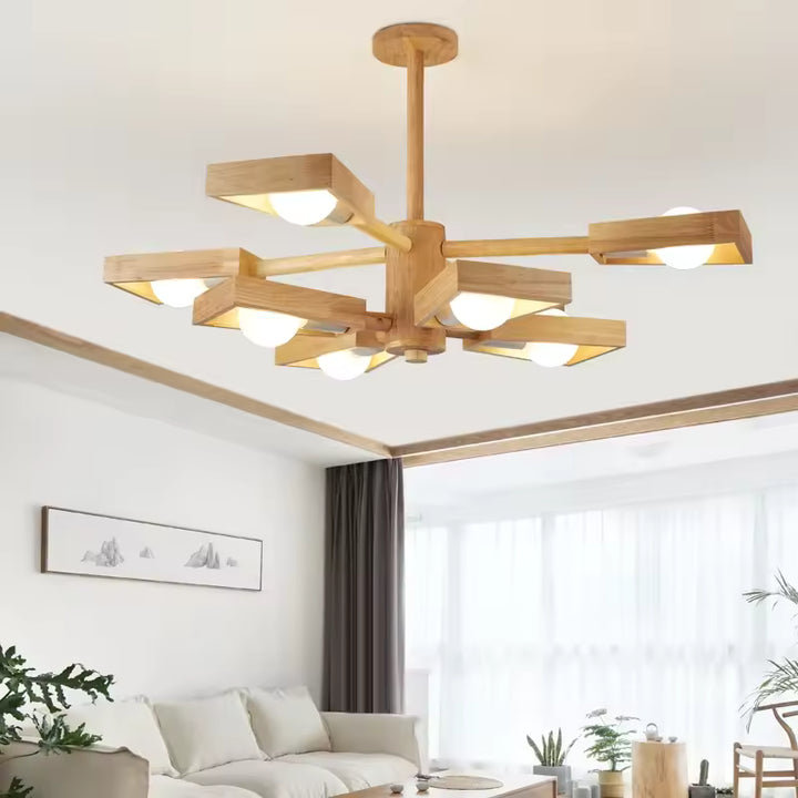 Suspension étoile en bois d’inspiration scandinave aux globes lumineux, installée dans un salon naturel et épuré
