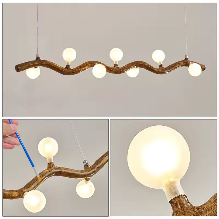 Trois vues d'une suspension au style organique, dévoilant sa branche sinueuse effet bois et ses globes lumineux blancs.