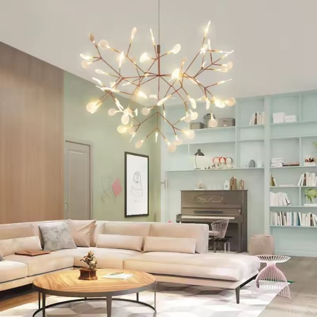 Suspension branche apportant une touche organique et lumineuse dans un salon moderne, mêlant style naturel, contemporain et ambiance chaleureuse.