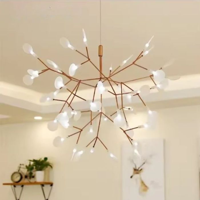 Suspension branche lumineuse au design organique, idéale pour un intérieur moderne inspiré de la nature et aux lignes aériennes élégantes.