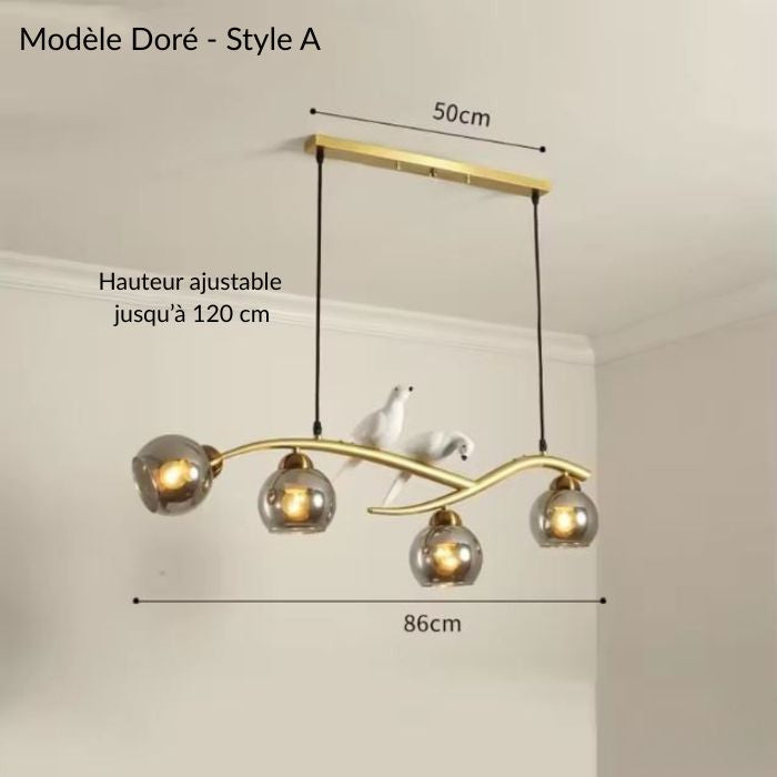 Suspension branche dorée avec oiseaux et quatre globes en verre gris au design organique et élégant