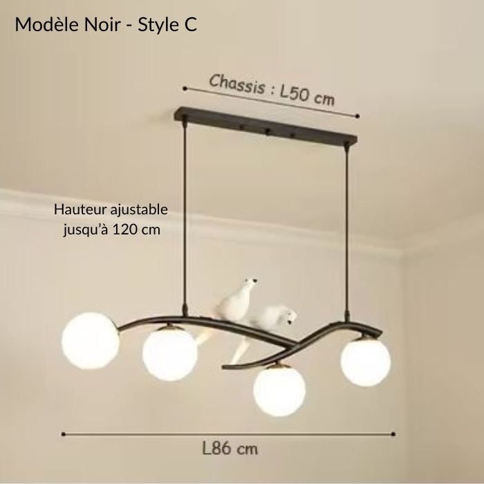Suspension branche noire avec oiseaux et globes opalins pour une décoration nordique douce et contemporaine