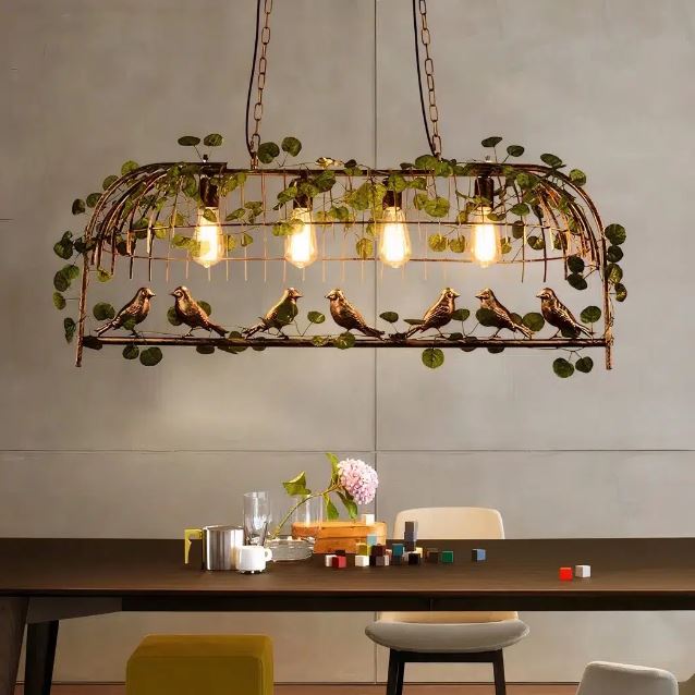 Suspension cage oiseau avec ampoules LED, un luminaire au style vintage parfait pour une salle à manger chaleureuse.