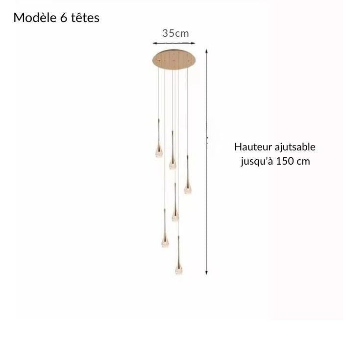 Suspension cristal doré à 6 têtes avec hauteur réglable jusqu’à 150 cm, parfaite pour un salon, une entrée ou un coin repas moderne.