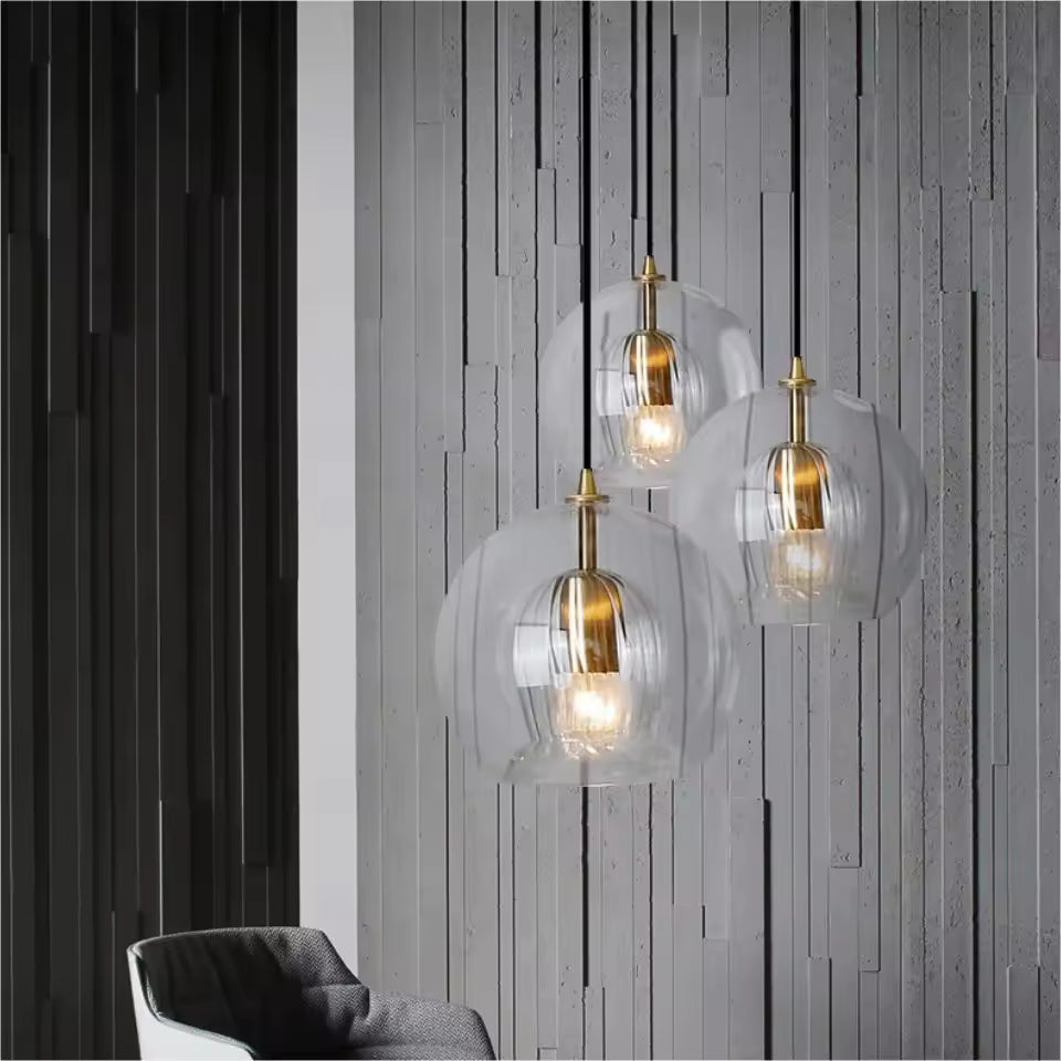 Trio de suspensions en double verre transparent à cœur strié, au design minimaliste contemporain
