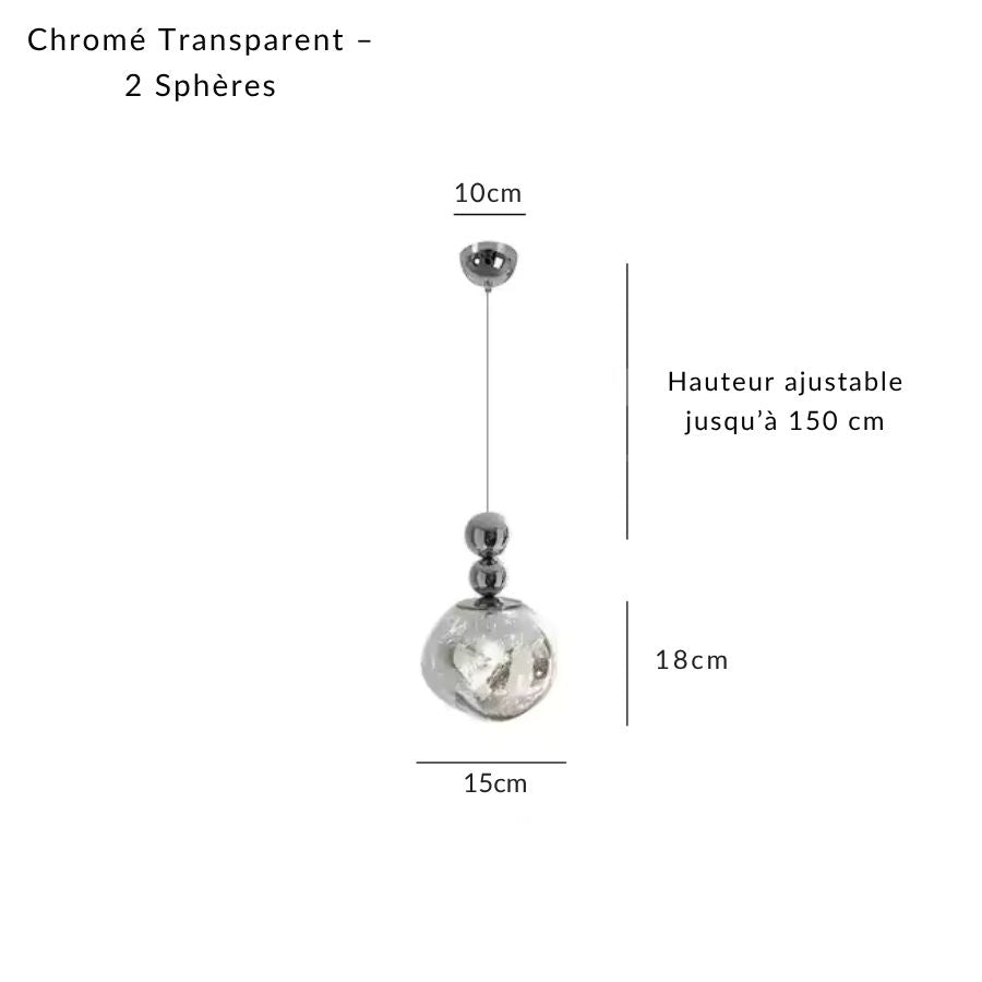 Suspension à globe transparent en acrylique et deux sphères chromées, au design compact et sculptural