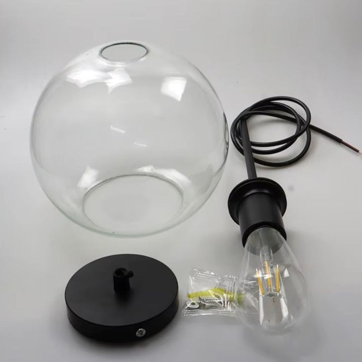 Suspension globe en verre transparent avec structure noire, câble, douille et ampoule apparente