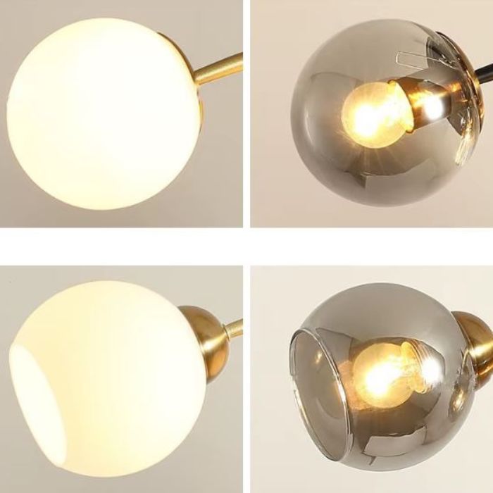 Comparatif des globes opalins et des globes en verre gris pour suspension branche au design contemporain et élégant