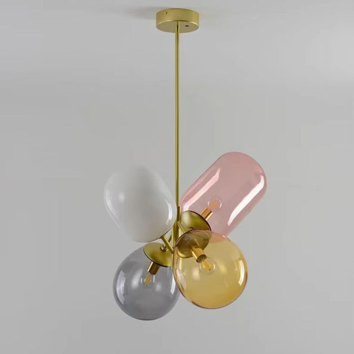 Suspension design rétro en grappe de verres rose, fumé, ambre et opalin avec élégante structure dorée