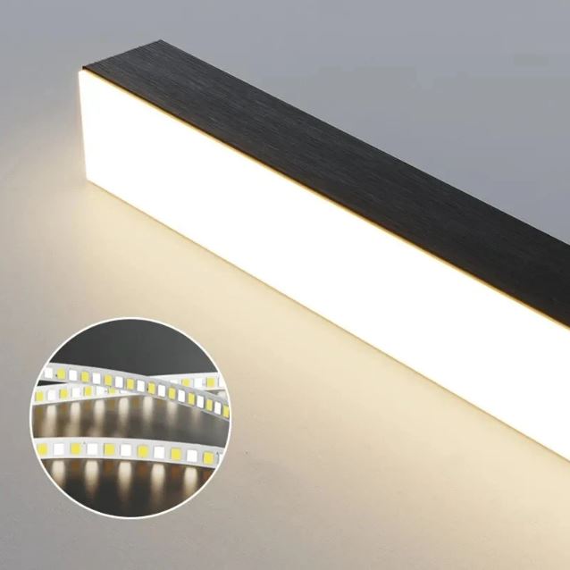Zoom sur l’éclairage LED puissant d’une suspension horizontale, offrant une lumière homogène et efficace pour tout intérieur design.