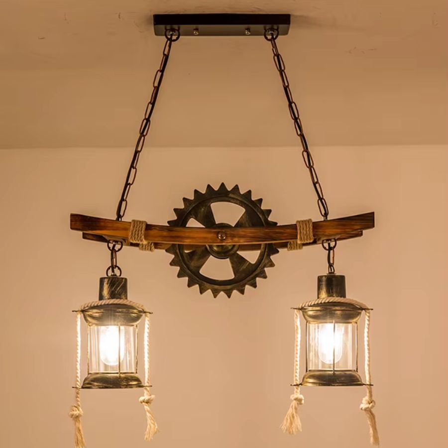 Suspension à deux lanternes en verre sur structure en bois, avec chaînes et roue dentée au style industriel ancien