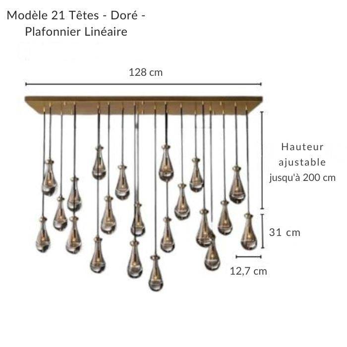 Grande suspension linéaire dorée, cascade de gouttes d'eau en verre, design moderne et raffiné pour intérieur.