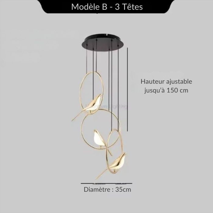 Suspension verticale à 3 oiseaux dorés dans des anneaux, diamètre 35 cm, parfaite pour escaliers ou angles modernes et élégants.