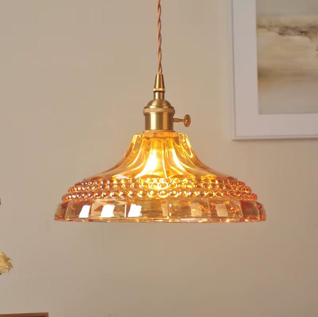 Suspension orange vintage en verre  design et rétro, idéale pour créer une ambiance lumineuse et stylée.
