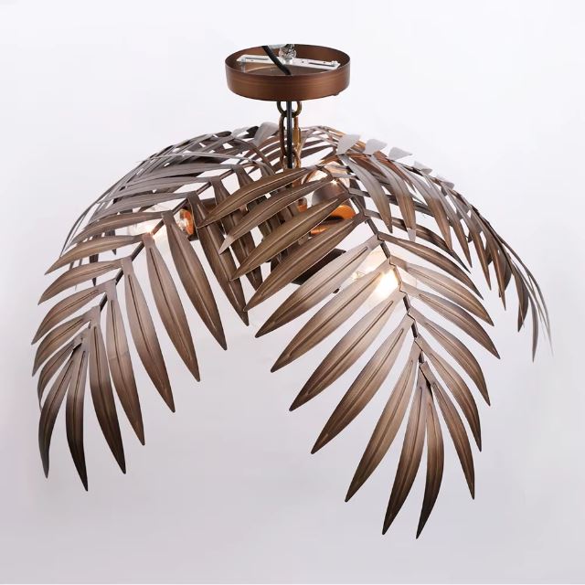 Suspension palmier en métal cuivré avec large feuillage décoratif, idéale pour un intérieur au style naturel et élégant.