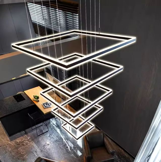 Suspension plafond cathédrale LED moderne idéale pour loft élégant avec grande hauteur et ambiance design.