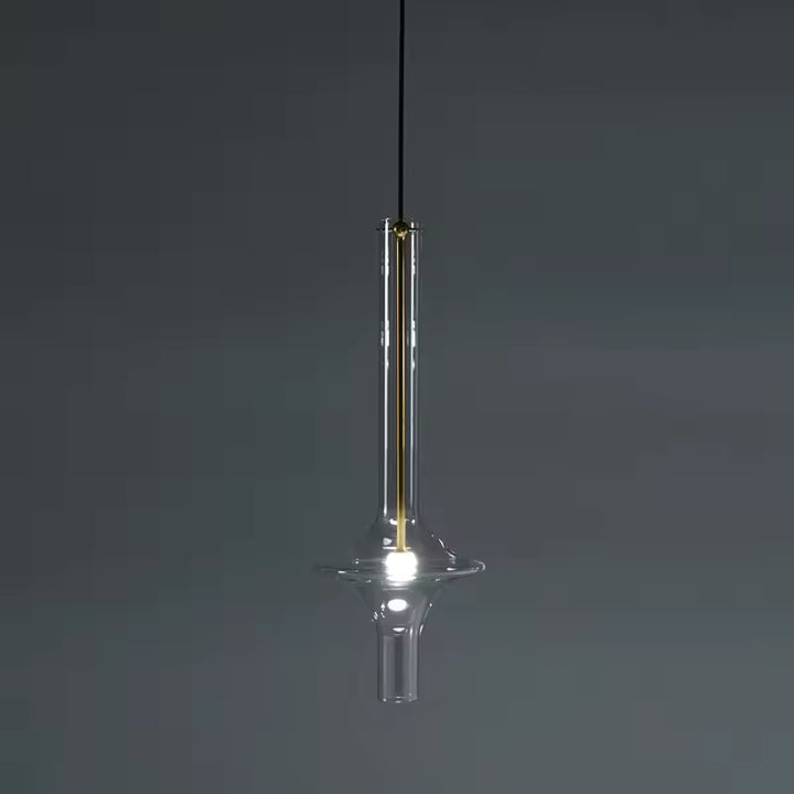 Suspension totem en verre transparent au profil élancé, avec silhouette sculpturale et design minimaliste contemporain