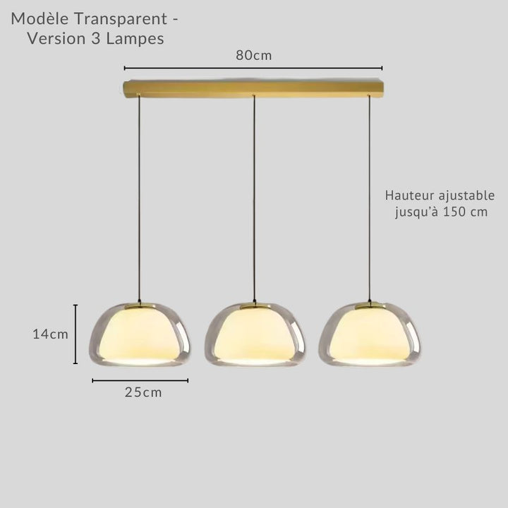 Suspension triple à trois cloches en verre transparent et cœur opalin sur barre dorée de 80 cm