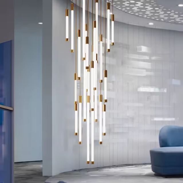 Suspension tube design élégante dans un espace contemporain aux murs blancs et mobilier minimaliste chic.