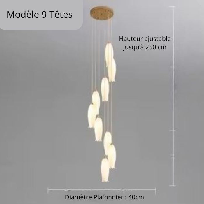 Suspension tulipe 9 têtes en céramique blanche pour plafond haut au design fluide et aérien.