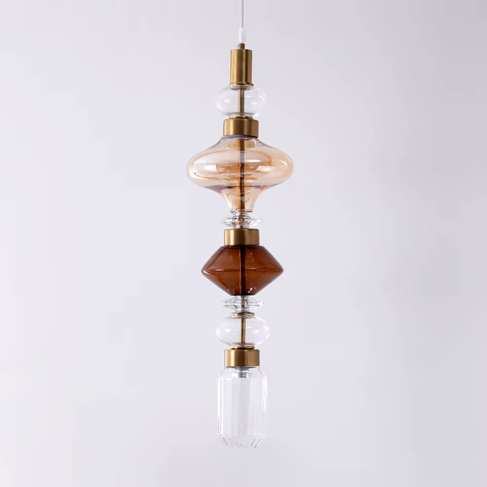 Suspension à silhouette verticale en verre transparent et ambré, rythmée par des formes sculpturales au charme vintage raffiné