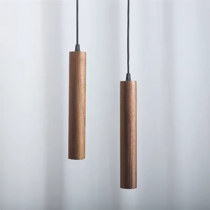 Duo de suspensions cylindriques en bois foncé au style contemporain, sobre et chaleureux
