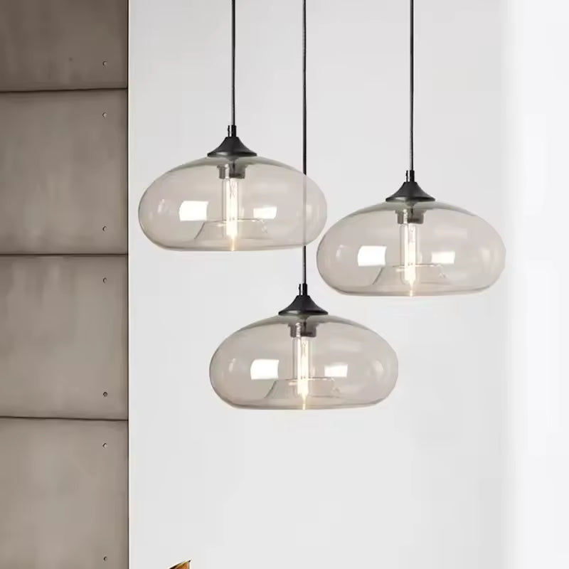 Composition de trois suspensions dôme en verre fumé au style contemporain, minimaliste et légèrement rétro